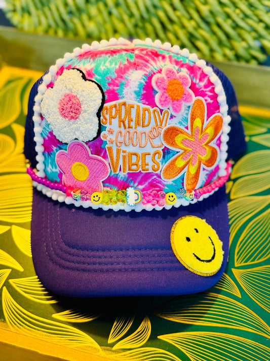 🌈 “Spread Good Vibes” Tie-Dye Trucker Hat – Handmade with Groovy Patches & Smiley Beads 🌼